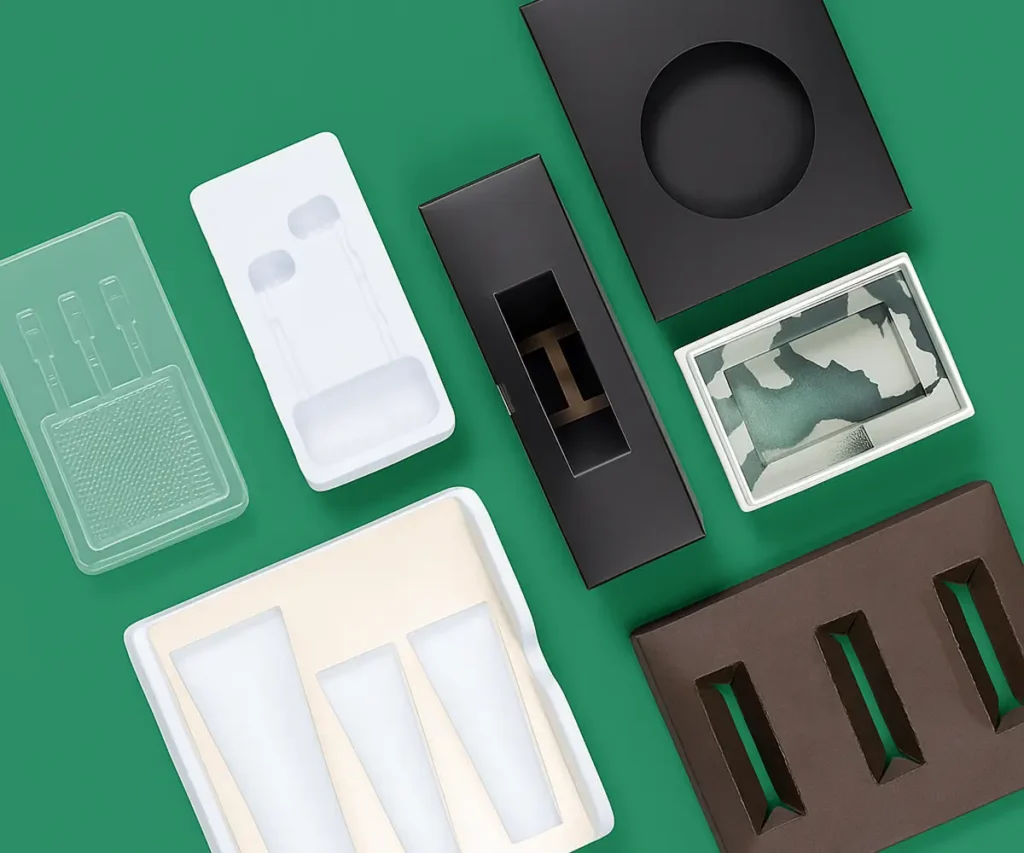Assorted custom packaging inserts made of EVA, paper, and plastic.