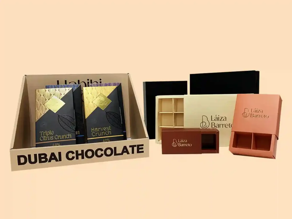 Custom chocolate packaging boxes and display stands with premium finishes.