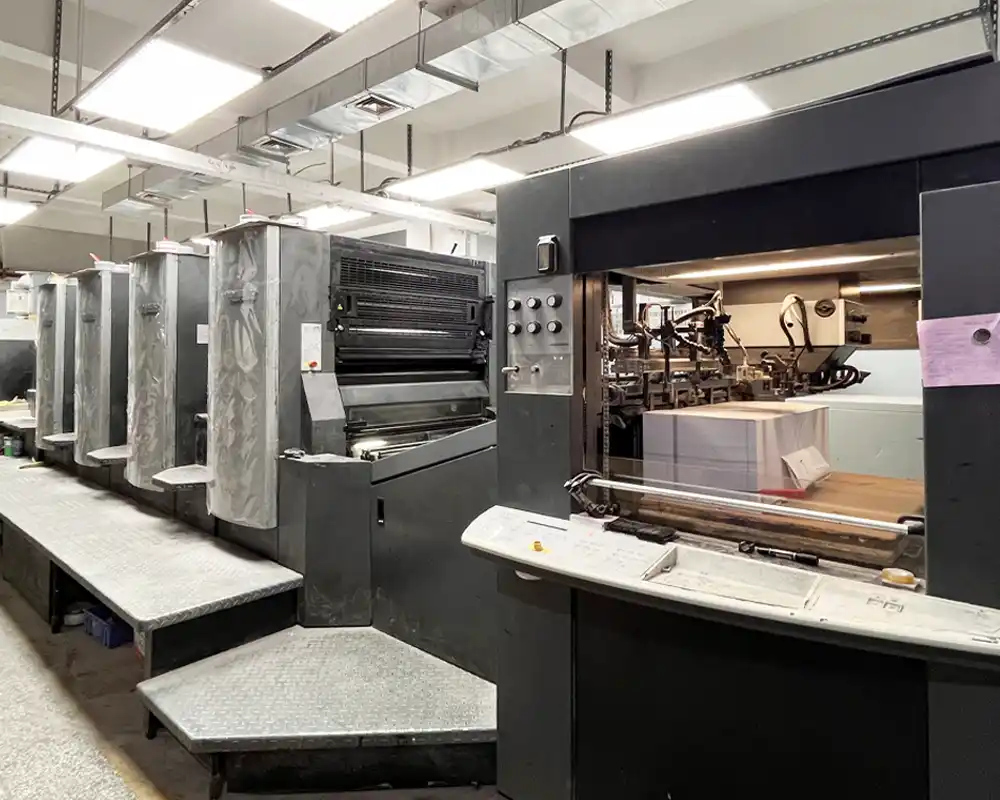 Heidelberg offset printing machine in factory workshop.