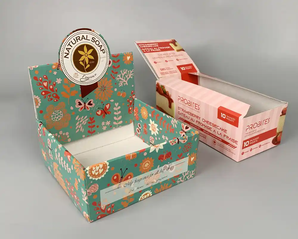 Custom cardboard display boxes for retail product presentation.