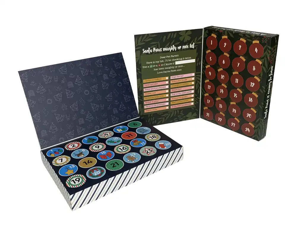 Festive custom packaging box with numbered blister inserts for chocolates or treats.