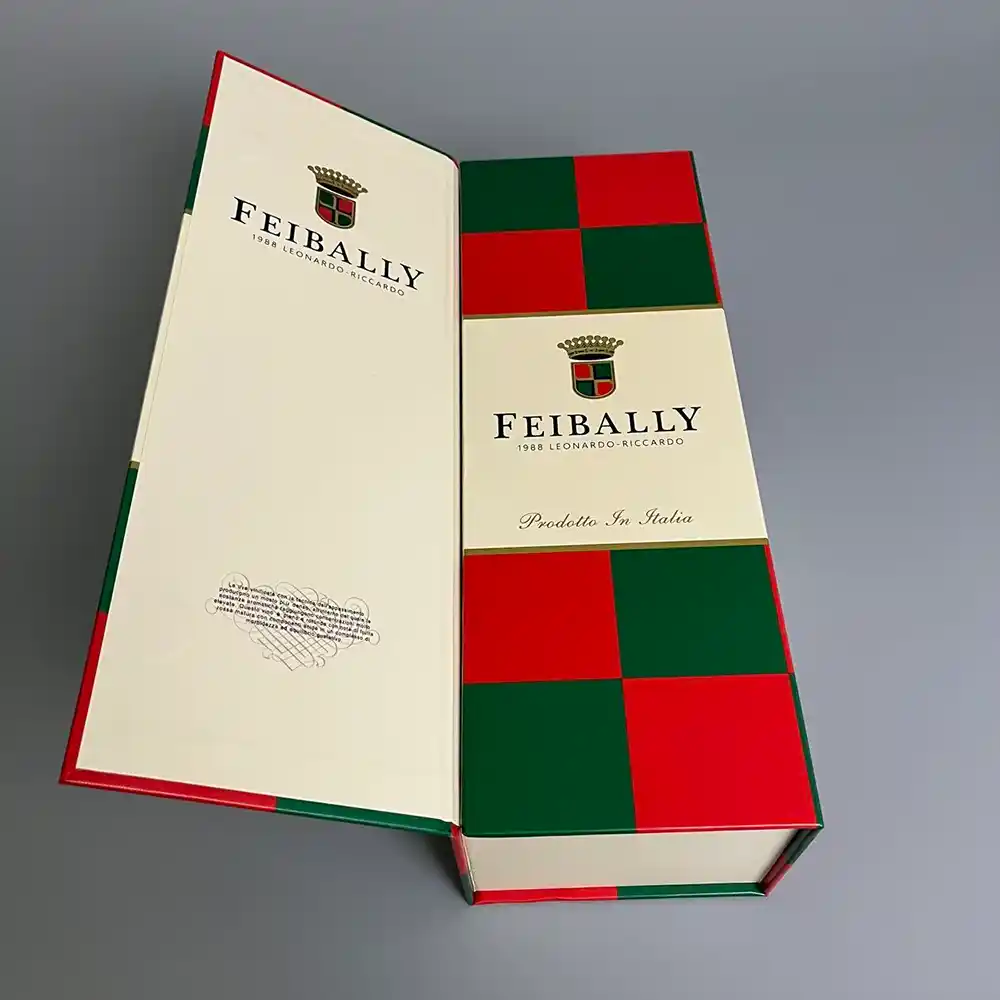 Closed white double-door magnetic wine gift box with red and green checkered design.