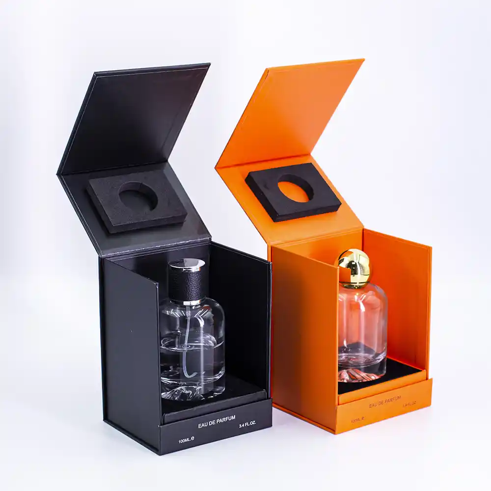 Black and orange hinged lid rigid boxes for perfume bottles with foam inserts