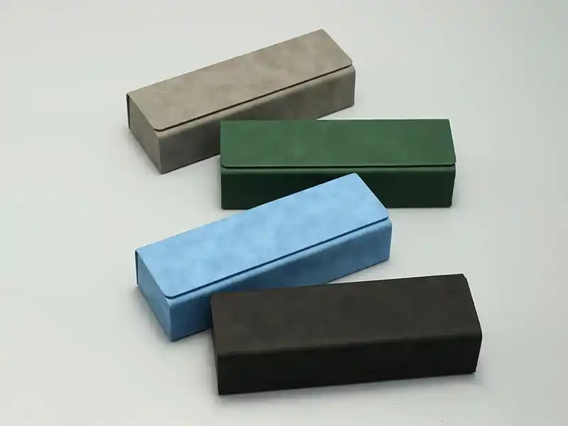 Set of rectangular suede paper pen boxes in assorted colors