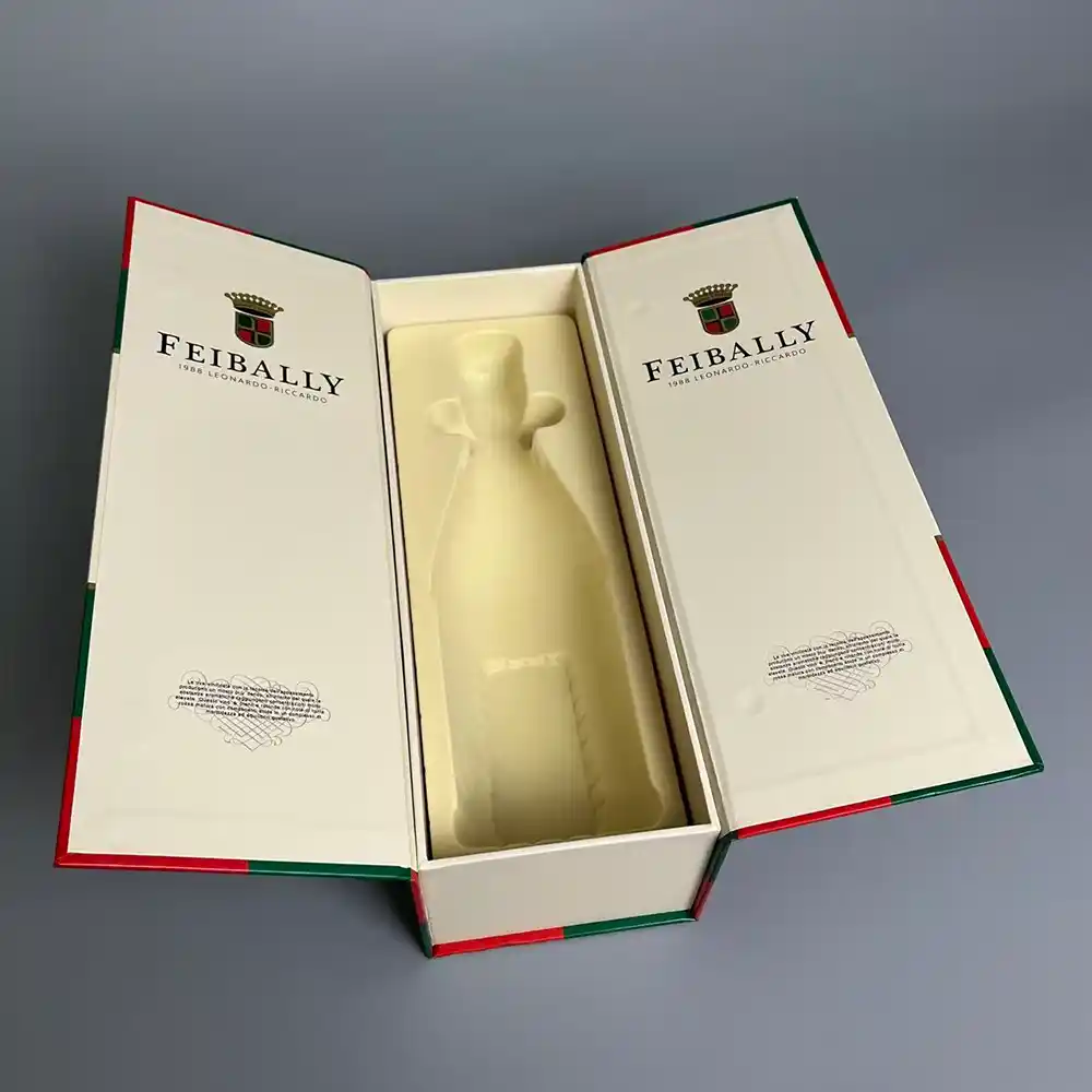Open white double-door magnetic wine gift box with custom bottle insert.