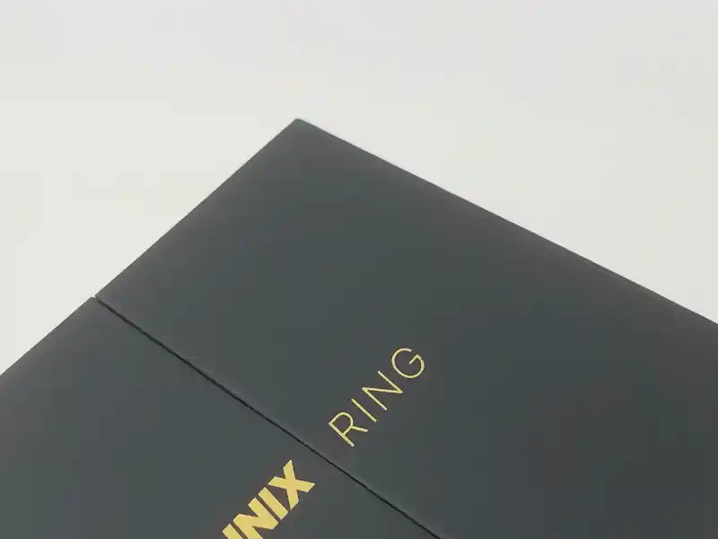 Black paper ring box with soft-touch matte lamination and gold foil text