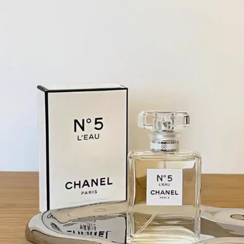 Chanel No. 5 L’Eau perfume bottle with minimalist white paper box.