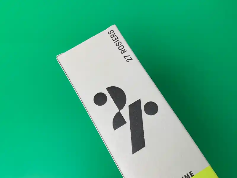 Cosmetic paper box with matte varnish finish on white surface