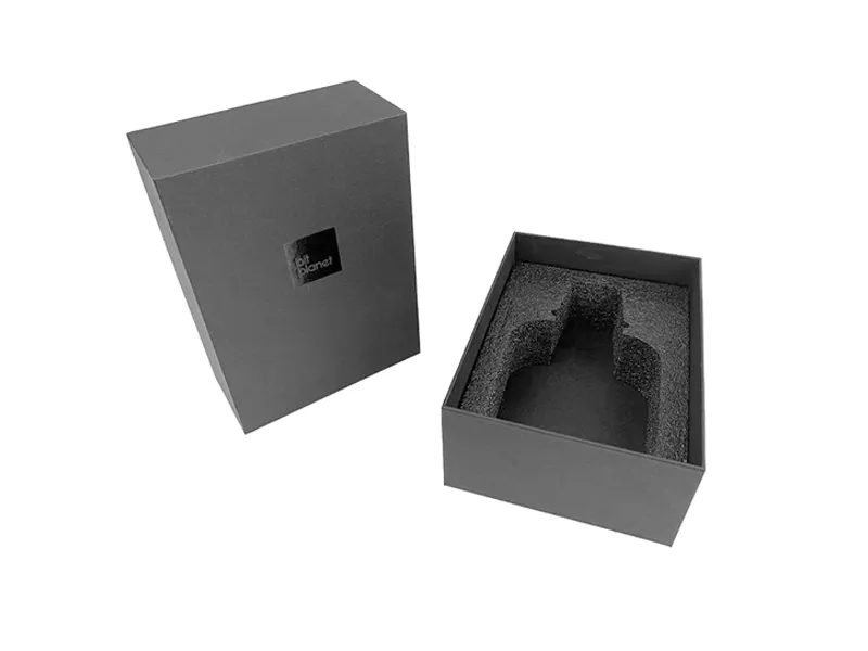 Black rigid box with custom foam insert for product protection