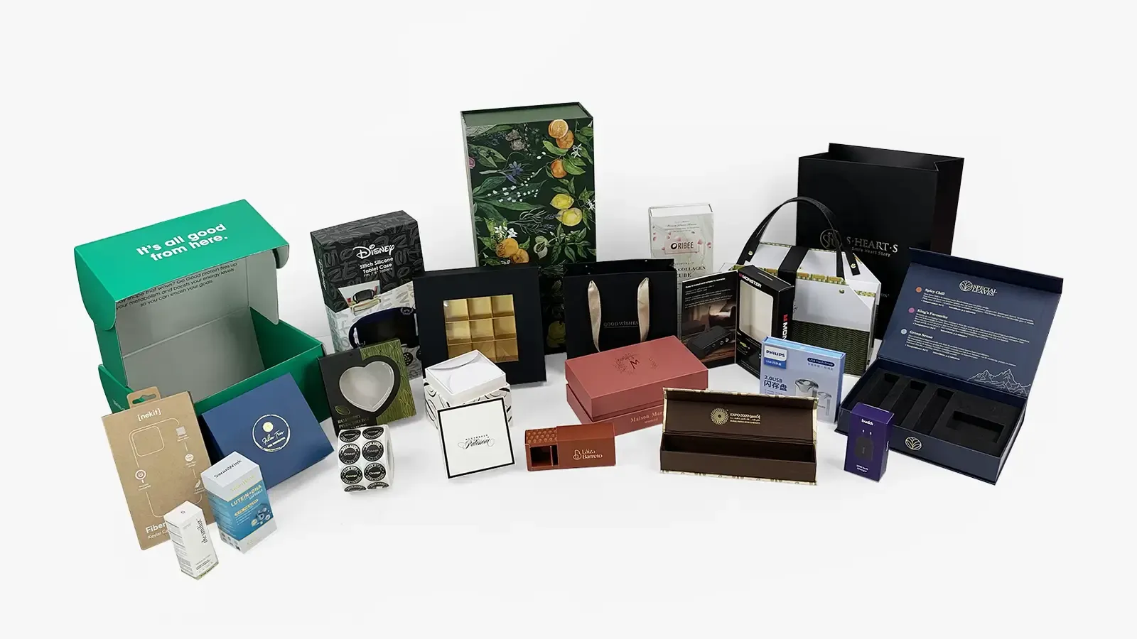 Custom packaging boxes, gift bags, and product cartons displayed for small business packaging comparison