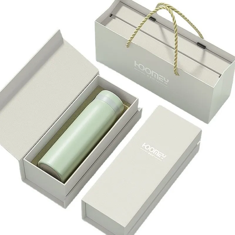 Green thermos cup in a custom drawer rigid box with matching gift bag and fitted inner insert
