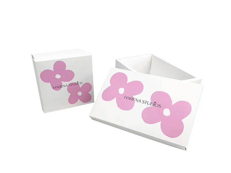 White foldable lid and base box with pink flower print shown assembled and open