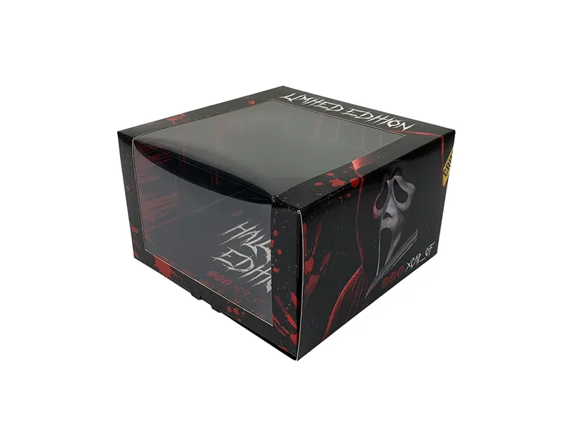Black custom tuck end box with clear window panel and Halloween-themed retail packaging design