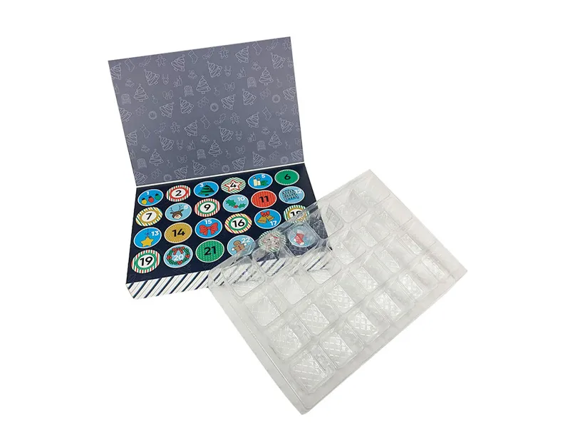 Flip-top folding advent calendar box with plastic insert tray for chocolates or small gifts