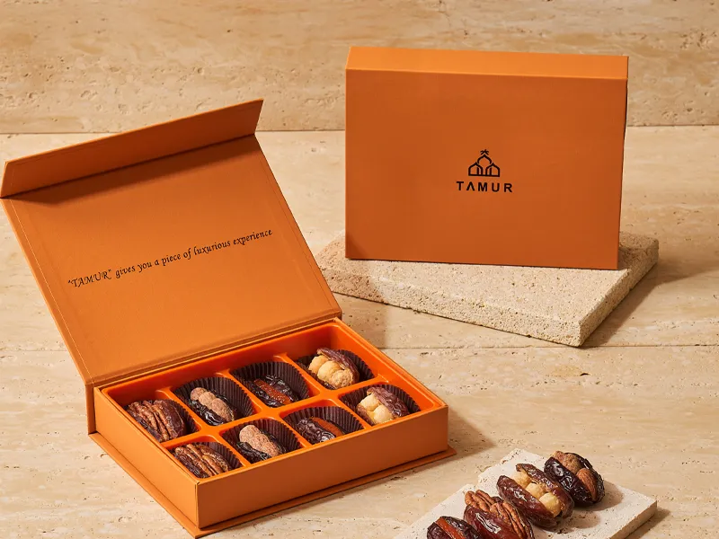Orange magnetic date gift box with insert tray and assorted stuffed dates